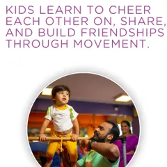 An instructor helps a toddler on the bar, demonstrating the trust and encouragement that is central to my teaching. Kids learn to cheer each other on and build friendships through movement.