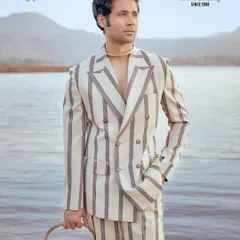 From my Sukoon collection, this striped Indo-Western suit is designed for calm charisma. The double-breasted cut and modern silhouette make it a standout choice for a reception or a stylish pre-wedding event.