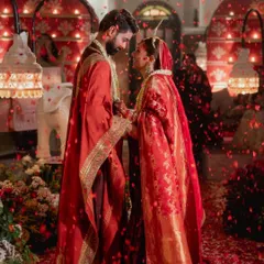 A romantic, petal-filled moment from Oishi and Arpit's wedding reception, captured beautifully for their Vogue Weddings feature.