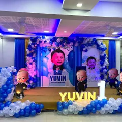 A closer look at the Boss Baby stage, showing the vibrant blue lighting and how the different elements like the marquee name and character props come together.