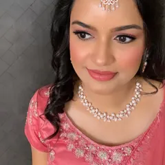 A close-up of the ring ceremony look, showing the flawless, airbrushed-effect skin and the soft, blended eyeshadow. It's a look that enhances natural beauty while still feeling special for the occasion.