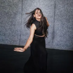 Capturing the dynamic movement of hair and fabric during a spin. My choreography often incorporates these elements to create visually striking moments.