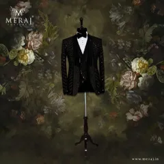 A modern twist on a classic, this black Italian tuxedo is enhanced with a fusion of foil sequins. It's a statement piece designed for the groom who wants to shine with contemporary elegance.
