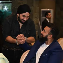 A candid moment of greeting with Mr. Raj Kundra. Building trust and personal connections is as important to us as the quality of our food and service.