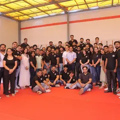 The entire team and guests at the library opening. This space was built by the community, for the community.