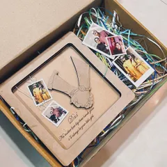 A truly special gift for a father. This custom MDF frame replicates a photo of holding hands and includes mini polaroid pictures, creating a multi-layered and sentimental keepsake.