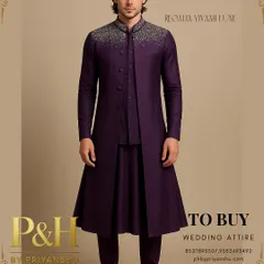 I designed this layered ensemble for the modern groom who seeks a blend of tradition and contemporary flair. It features a deep purple Anarkali-style kurta under a structured half-jacket and a long, flowing top jacket, crowned with brilliant silver hand-embroidery on the collar and shoulders.