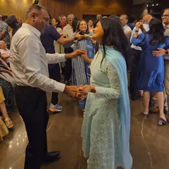 A couple enjoying a dance at the book launch event. My music selection always includes songs for everyone, from dance tracks to romantic classics.