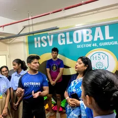 Explaining the principles behind a technique to students and teachers at HSV Global School. It's important that they understand the 'why' behind every move, so they can adapt it to different real-life situations.