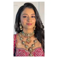 A close up of Mithila's reception makeup. Notice the soft yet defined features, a signature style that I teach my students to create for a luxe, polished finish.