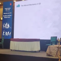 The stage is set for my presentation on 'The Altered Mechanics in Scapular Dyskinesis'. Understanding the biomechanics of movement is fundamental to treating shoulder pathologies effectively.