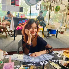 Here I am in my element at a pop-up event. This is my safe space, where I connect with you, and the cards tell their story. It's always an honor to hold this space for you in person.