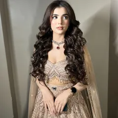 For this engagement, we went for full-on glamour with voluminous Hollywood waves and a soft, sculpted makeup look. This style is perfect for making a statement and is designed to look incredible in photos and last all night.