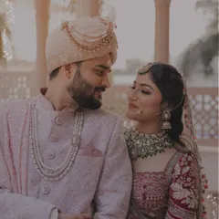 An intimate moment between the bride and groom, captured in the soft, warm light of their wedding day. These are the quiet, in-between moments that tell the real story of your love.