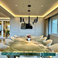 A custom sculpture should feel like it was born in the space it inhabits. This matte black and grey steel installation was commissioned for a client's dining room, creating a focal point that is both modern and timelessly elegant.