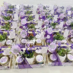 A large order of our lavender theme birthday hampers for Kaira's first birthday. Each hamper contains a mix of healthy and tasty treats, along with a beautiful ceramic Buddha planter.