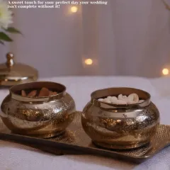 A sweet touch for your perfect day. These small, hammered gold-finish bowls on a matching tray are ideal for serving dry fruits or nuts to guests during wedding functions.