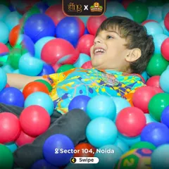 This is the look of pure joy I love to see. Our colorful ball pit is a favorite spot for kids to dive in, laugh, and just be kids in a safe and fun environment.