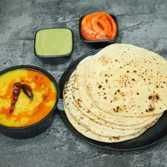 For those who love the classics, here is a simple and comforting meal of Dal Tadka with a stack of my soft, home-style tawa rotis. It's the ultimate comfort food.