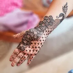 I always wanted to try a bold design like this, with heavy floral elements and a peacock. I was so happy when a client requested it!