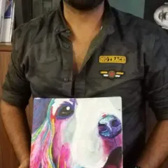 A wonderful example of personal expression, this student created a colorful and modern pop art painting of his beloved pet dog.