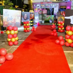 The grand entrance to the Bollywood party, complete with a red carpet, movie-style posters, and balloon pillars. It made every guest feel like a celebrity arriving at a movie premiere.