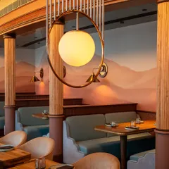 Find your corner in one of our comfortable booths. The gentle curves and soft upholstery offer a sense of privacy within the lively main dining area, perfect for smaller groups or breakout conversations during a larger event.