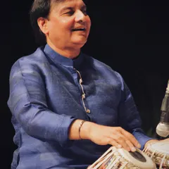 Another still from the Taal Chakra concert, a moment of happiness while playing for an appreciative audience.