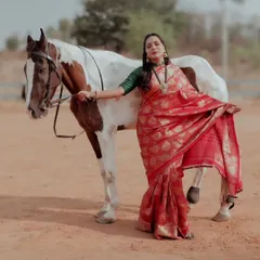 A duplicate of image 54, showcasing the flowing movement of the saree.