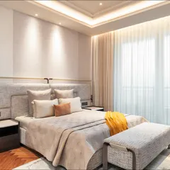 A bedroom should be a personal retreat, a space of quiet rest. For this master bedroom, we designed a custom upholstered headboard with integrated metal detailing, paired with bespoke nightstands. The interplay of soft textiles, warm lighting, and clean lines creates an atmosphere of serene, understated luxury.