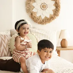 The beginning of a lifelong friendship. This photo of a big brother with his baby sister is filled with so much warmth and happiness. Sibling photos are a special part of my family sessions, preserving these early bonds.