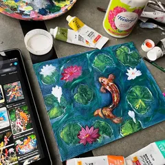 The finished acrylic painting of a koi fish pond on canvas. I used reference images to capture the graceful movement of the fish and the serene quality of the water with its lily pads and flowers.