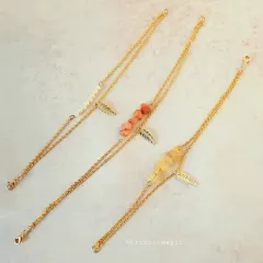 A trio of my elegant charm bracelets. Featuring pearls, gemstones, and a golden leaf charm on a delicate double-layered chain, these are perfect for stacking or wearing alone.