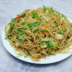 A classic plate of Veg Hakka Noodles, tossed with crunchy vegetables and savoury sauces. It's a simple, delicious, and fulfilling meal on its own.
