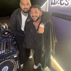 Posing with a friend at the GQ Best Dressed event. These high-profile parties are also great opportunities to connect with people from different industries.