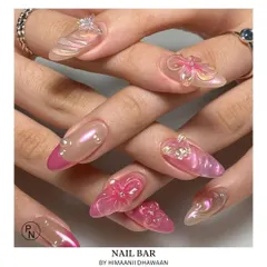 Soft and dreamy 3D floral art. This design uses translucent pink flowers and pearl accents to create a delicate, multi-dimensional look.