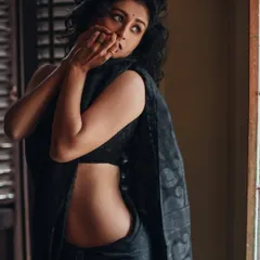 A powerful portrait of actress Chitrangada Chakraborty. For this look, I focused on defining her features with soft contouring and a subtle smokey eye, complementing the traditional yet modern feel of the black saree.