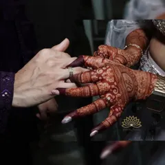 The moment of the ring exchange, with the beautiful, dark mehndi stain as the perfect backdrop. This is a testament to the rich color my natural henna provides.