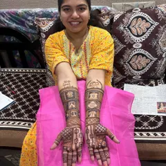 Our happy client showing off her full baby shower mehndi. We make sure to provide a comfortable experience at your home, so you can relax and enjoy the process.