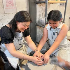 There's nothing quite like the shared laughter between a mother and daughter as they create together. Our family pottery sessions are all about making memories while making masterpieces on the pottery wheel.