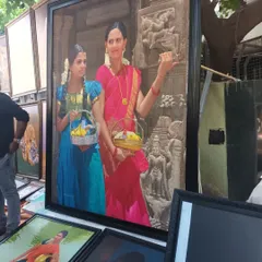 A stunning, large-scale realistic portrait on display at the 22nd Chithrasanthe in Bangalore. This event showcases some of the best artistic talent.