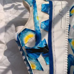 A detail shot of the "Starry Night" swoosh. I love how the patchwork design of the Billie Eilish edition AF1s breaks up the painting into interesting geometric shapes.