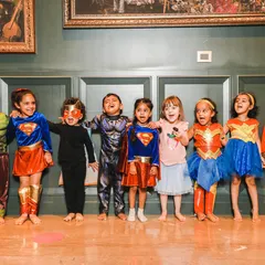 Our little superheroes getting into character. Themed dance parties are one of our specialties. We work with you to create a magical experience based on what your child loves, complete with custom choreography and lots of fun.