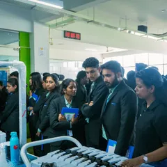 An attentive group of students observing our assembly line for energy meters. These industrial visits provide a practical link between their academic learning and the technology that powers our world.