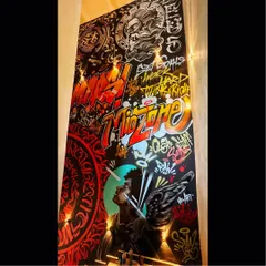This 30-foot mural for an office space combines multiple styles. It features calligraffiti, character art, and motivational text, creating a visually dense and inspiring piece.