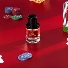 Capturing the festive spirit with a Diwali party theme. We created a dark, luxurious scene with playing cards and poker chips to give this fragrance a sophisticated and celebratory feel, perfect for a festive night.