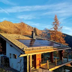 A magazine feature showcasing our Swiss chalet. It highlights how the design harmonizes with the stunning mountain scenery, a testament to our site-specific approach to architecture.