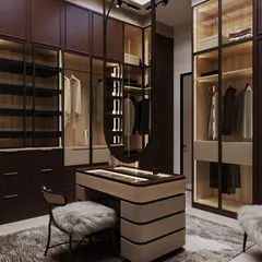 Another view of the dressing room, showing the faux skylight that diffuses soft, natural-feeling light throughout the space, making it feel luminous and indulgent.