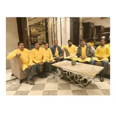My team, ready in our signature yellow kurtas for a wedding event. We are professional, experienced, and ready to make your event special.