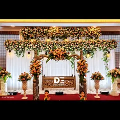 A closer look at the stunning floral work on our wooden jhoola setup. The combination of peach, orange, and white roses creates a soft yet celebratory feel for a cradle ceremony.